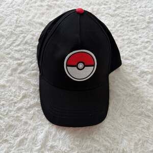 Pokemon Pokeball Black Snapback Ball Cap with Graphic Flat Bill (2016)